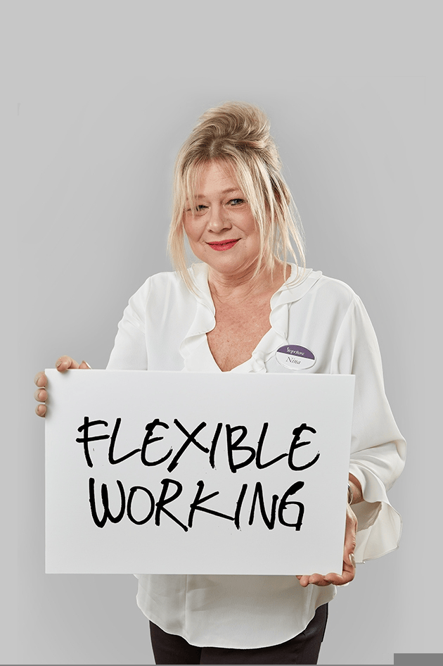 Signature colleague holding flexible working sign